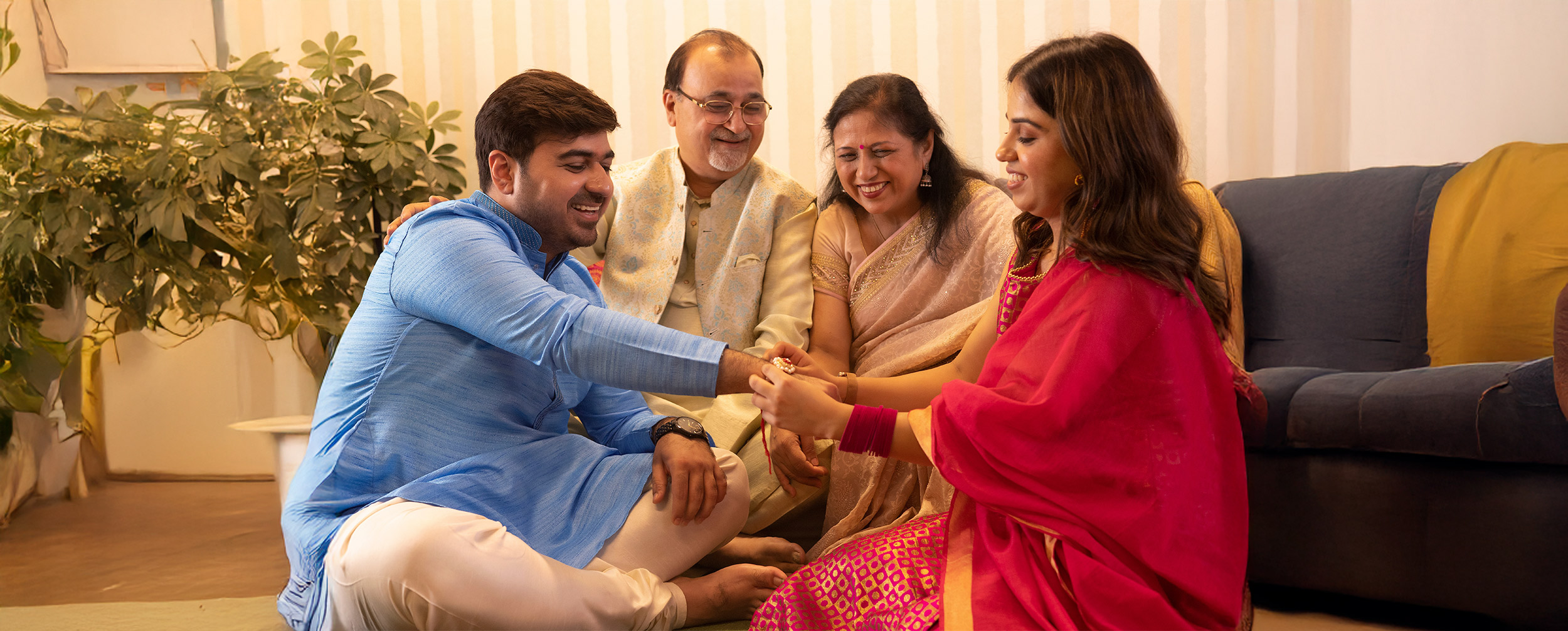 A sister tying Rakhi on her brother's wrist during Raksha Bandhan. A sister tying Rakhi on her brother's wrist during Raksha Bandhan.