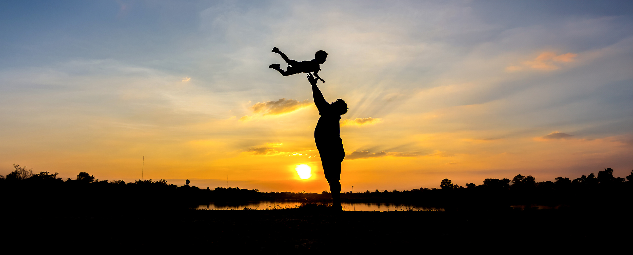 Father holding his young son in his arms. Father holding his young son in his arms.